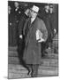 Al Capone, Winks at Photographers as He Leaves Chicago's Federal Courthouse-null-Mounted Photo