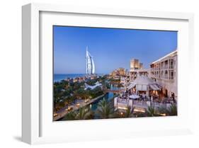 Al Quasr Hotel with Burj Al Arab at the Madinat Jumeirah Resort, Jumeirah Beach, Dubai-null-Framed Art Print