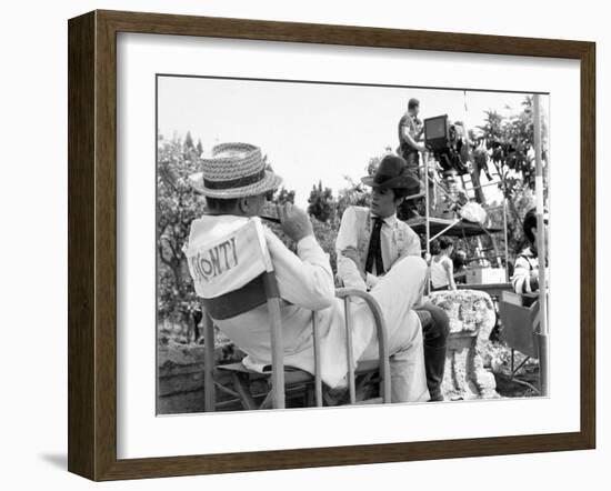 Alain Delon and director Luchino Visconti on set of film "The Leopard", 1962 (b/w photo)-null-Framed Photo