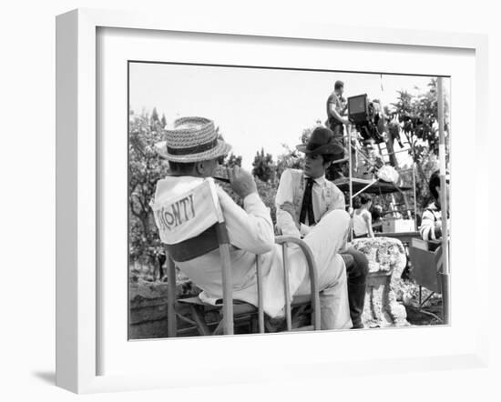 Alain Delon and director Luchino Visconti on set of film "The Leopard", 1962 (b/w photo)-null-Framed Photo