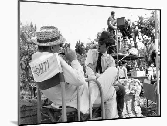 Alain Delon and director Luchino Visconti on set of film "The Leopard", 1962 (b/w photo)-null-Mounted Photo