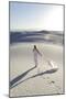 Alamogordo, New Mexico. Woman Walking in White Sands National Monument-Julien McRoberts-Mounted Photographic Print