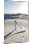 Alamogordo, New Mexico. Woman Walking in White Sands National Monument-Julien McRoberts-Mounted Photographic Print