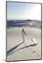 Alamogordo, New Mexico. Woman Walking in White Sands National Monument-Julien McRoberts-Mounted Photographic Print