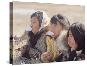 Alaska: Native Alaskan Girls Blowing Bubbles-Ralph Crane-Stretched Canvas