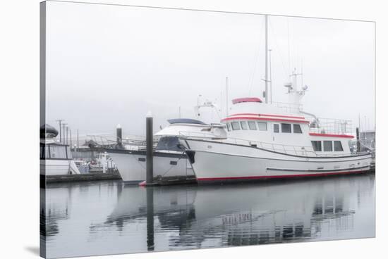 Alaska, Valdez. Two fishing boat in a foggy marina.-Janet Muir-Stretched Canvas