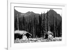 Alaska - View of Trapper's Cabin and Cache-Lantern Press-Framed Art Print