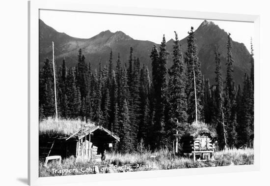 Alaska - View of Trapper's Cabin and Cache-Lantern Press-Framed Art Print