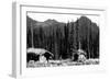 Alaska - View of Trapper's Cabin and Cache-Lantern Press-Framed Art Print