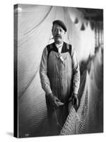 Alaskan Fisherman with Fishing Net, 1916-null-Stretched Canvas