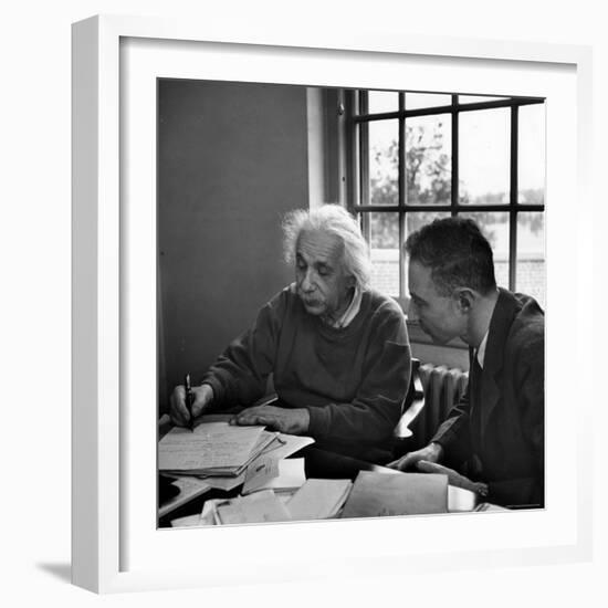 Albert Einstein, in Discussion with Robert Oppenheimer in Office Institute for Advanced Study-Alfred Eisenstaedt-Framed Premium Photographic Print