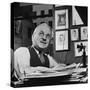 Albert Kahn Sitting at a Desk-Bernard Hoffman-Stretched Canvas