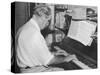 Albert Schweitzer French Theologian Philosopher Missionary Physician and Music Scholar Playing Bach-null-Stretched Canvas