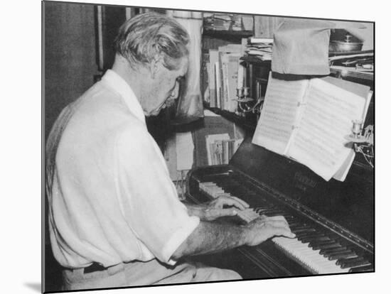 Albert Schweitzer French Theologian Philosopher Missionary Physician and Music Scholar Playing Bach-null-Mounted Photographic Print