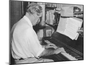 Albert Schweitzer French Theologian Philosopher Missionary Physician and Music Scholar Playing Bach-null-Mounted Photographic Print