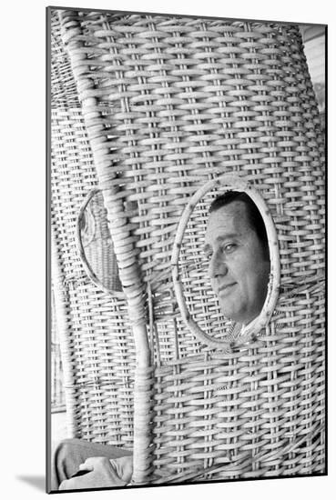 Alberto Sordi Through the Eyelet of a Wicker Armchair-Marisa Rastellini-Mounted Photographic Print