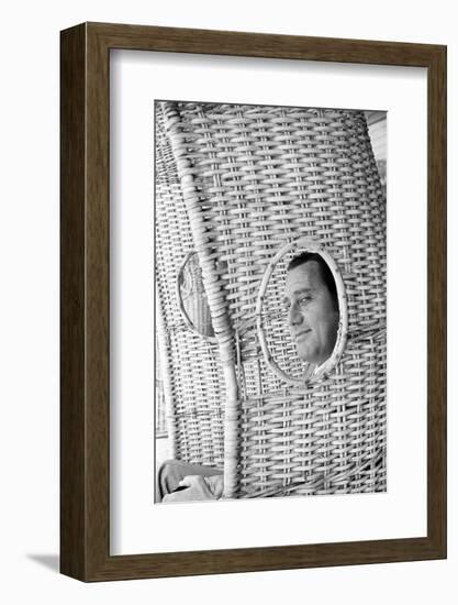 Alberto Sordi Through the Eyelet of a Wicker Armchair-Marisa Rastellini-Framed Photographic Print