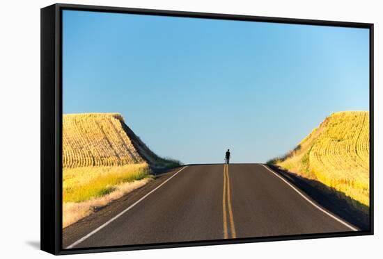 Alek Engerbretson Skateboarding Down A Rural Highway Near Oakesdale, Washington-Ben Herndon-Framed Stretched Canvas