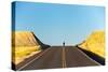 Alek Engerbretson Skateboarding Down A Rural Highway Near Oakesdale, Washington-Ben Herndon-Stretched Canvas