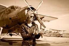 Portrait of Beautiful Female Pilot with Plane Behind. Sepia Photo.-Aleksandar Todorovic-Art Print