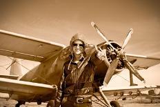 Portrait of Beautiful Female Pilot with Plane Behind. Sepia Photo.-Aleksandar Todorovic-Art Print