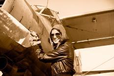 Portrait of Beautiful Female Pilot with Plane Behind. Sepia Photo.-Aleksandar Todorovic-Art Print