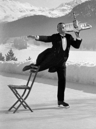 Waiter Rene Brequet with Tray of Cocktails as He Skates Around Serving Patrons at the Grand Hotel