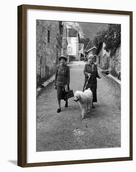 Alice B. Toklas and Author Gertrude Stein, Walking Poodle "Basket" During Liberation from Germans-Carl Mydans-Framed Premium Photographic Print