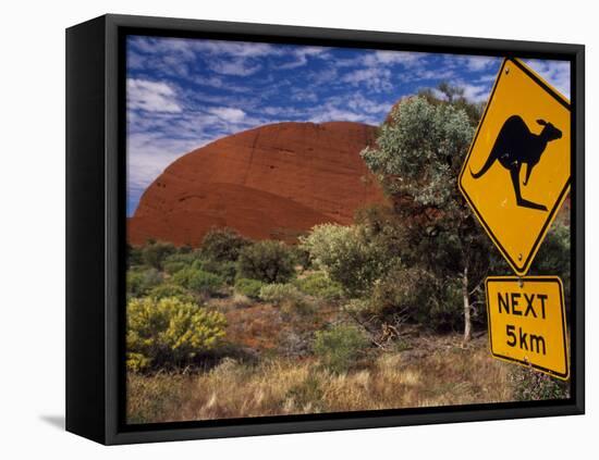 Alice Springs, Traffic Sign Beside Road Through Outback, Red Rocks of Olgas Behind, Australia-Amar Grover-Framed Stretched Canvas