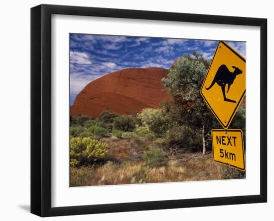 Alice Springs, Traffic Sign Beside Road Through Outback, Red Rocks of Olgas Behind, Australia-Amar Grover-Framed Premium Photographic Print