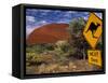 Alice Springs, Traffic Sign Beside Road Through Outback, Red Rocks of Olgas Behind, Australia-Amar Grover-Framed Stretched Canvas