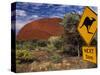 Alice Springs, Traffic Sign Beside Road Through Outback, Red Rocks of Olgas Behind, Australia-Amar Grover-Stretched Canvas