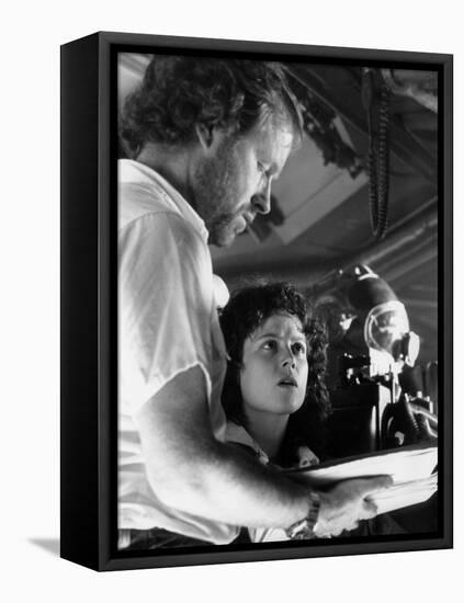 Alien, 1979 directed by Ridley Scott On the set, Ridley Scott directs Sigourney Weaver (photo)-null-Framed Stretched Canvas