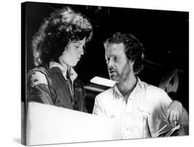 Alien, 1979 directed by Ridley Scott On the set, Ridley Scott directs Sigourney Weaver (photo)-null-Stretched Canvas