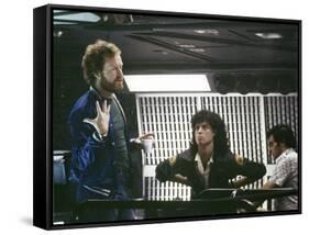 Alien, 1979 directed by Ridley Scott On the set; the director (Ridley Scott) with Sigourney Weaver -null-Framed Stretched Canvas