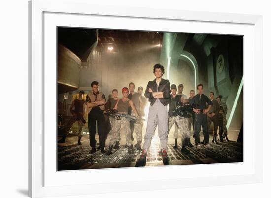 ALIENS, 1986 directed by JAMES CAMERON with Sigourney Weaver between Paul Reiser, Michael Biehn, Je-null-Framed Photo