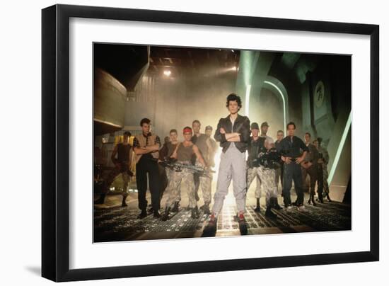 ALIENS, 1986 directed by JAMES CAMERON with Sigourney Weaver between Paul Reiser, Michael Biehn, Je-null-Framed Photo