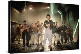 ALIENS, 1986 directed by JAMES CAMERON with Sigourney Weaver between Paul Reiser, Michael Biehn, Je-null-Stretched Canvas