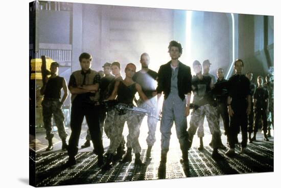 ALIENS, 1986 directed by JAMES CAMERON with Sigourney Weaver between Paul Reiser, Michael Biehn, Je-null-Stretched Canvas