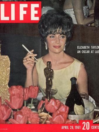 Actress Elizabeth Taylor with her Academy Award at an Oscar Party Following her Win, April 28, 1961