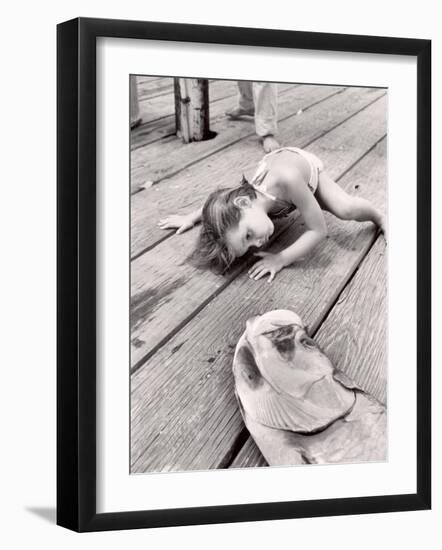 Allen Cook's Daughter Looking at the Open Mouth of a Just Caught, Giant Fish-Alfred Eisenstaedt-Framed Photographic Print