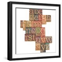 Alphabet - Abstract of Vintage Wooden Letterpress Printing Blocks Stained by Color Inks, Isolated O-PixelsAway-Framed Photographic Print