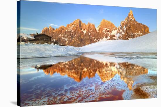 Alpin Lake in Springtime it's Reflecting the Segantini Hut and the Pale Di San Martino Ridges-ClickAlps-Stretched Canvas