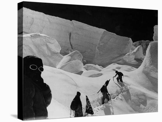 Alpinists Walking in the Snow-null-Stretched Canvas