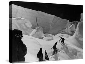 Alpinists Walking in the Snow-null-Stretched Canvas