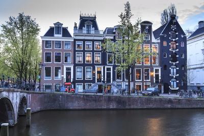 Old Gabled Houses Line the Keizersgracht Canal at Dusk, Amsterdam, Netherlands, Europe