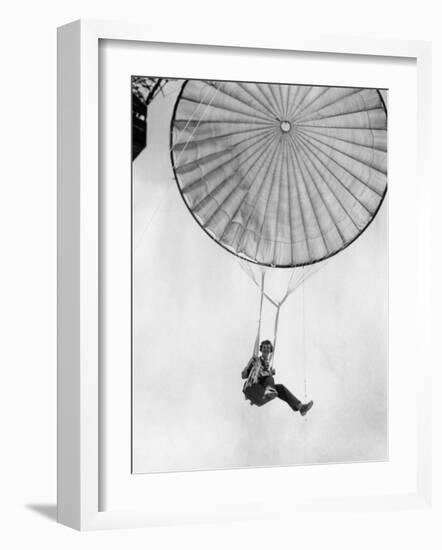 Amelia Earhart Helps Test a Commercial Parachute. June 2, 1935-null-Framed Photo