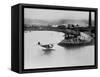 Amelia Earhart's Plane Leaving Port-null-Framed Stretched Canvas