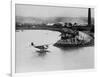 Amelia Earhart's Plane Leaving Port-null-Framed Photographic Print
