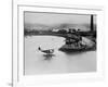 Amelia Earhart's Plane Leaving Port-null-Framed Photographic Print